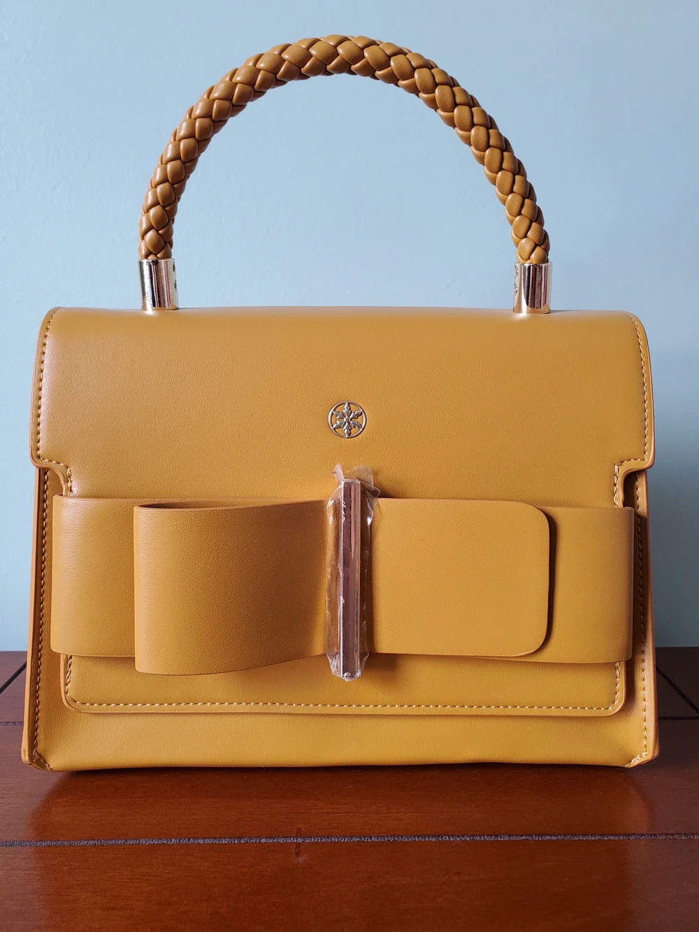 Structured Yellow Satchel with Braided Top Handle and Bow Accent